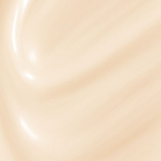 Smooth champagne cream texture of Lucky Chick Dawn Glow Fruit-Infused Illuminizer with radiant shimmer finish.