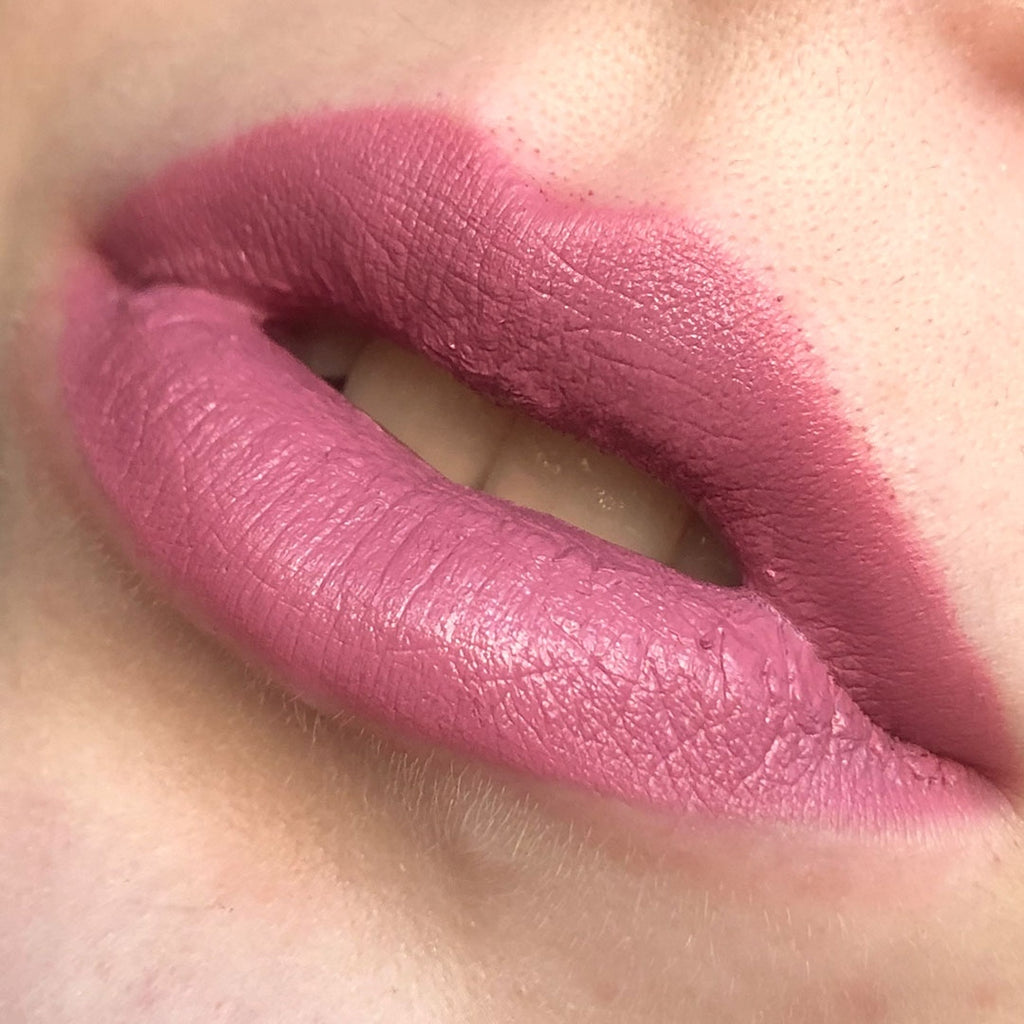 A close up of lips with a model wearing A close up of lips with a model wearing Fierce Semi-Matte Lipstick Semi-Matte Lipstick