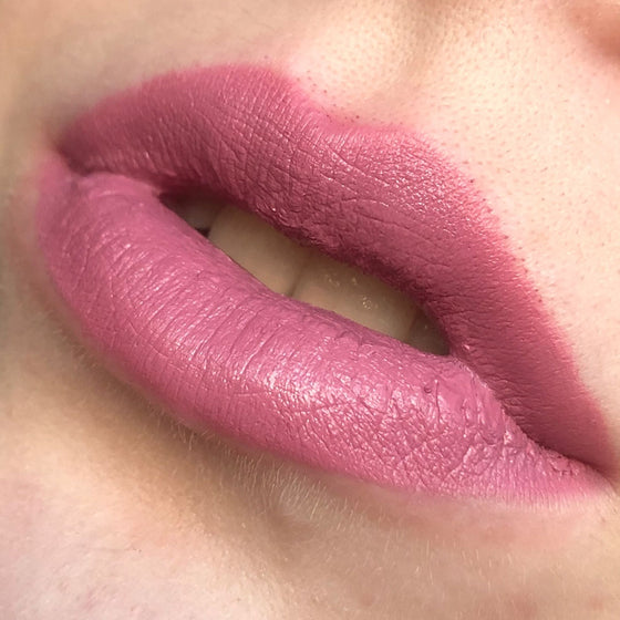 A close up of lips with a model wearing A close up of lips with a model wearing Fierce Semi-Matte Lipstick Semi-Matte Lipstick