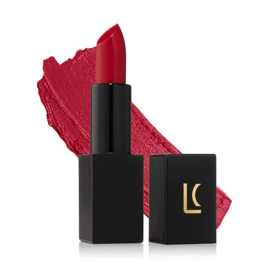 Lucky Chick Vegan Creamy Matte Lipstick in Desire shade with lipstick swatch in the background