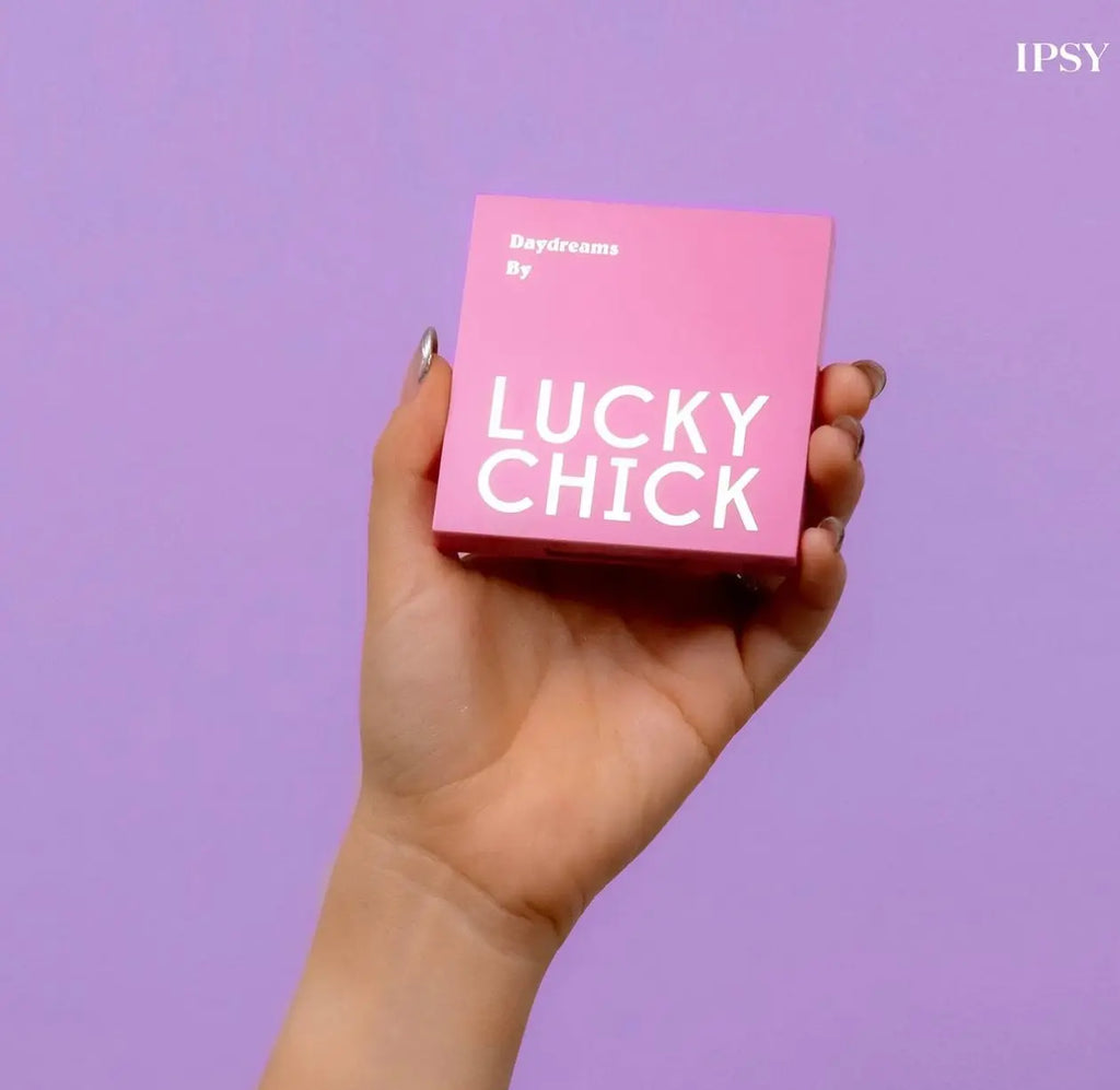 Lucky Chick Daydreams Eyeshadow Palette held in hand – compact size with 9 versatile shades