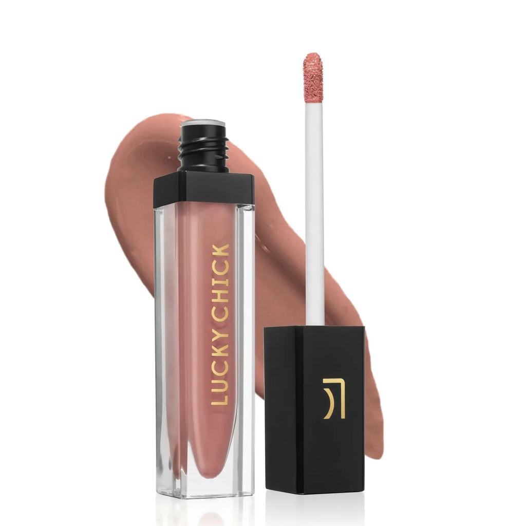 Lucky Chick Hydrating Lip Gloss in Paradise – clear tube with gold logo and black cap, vibrant red gloss finish