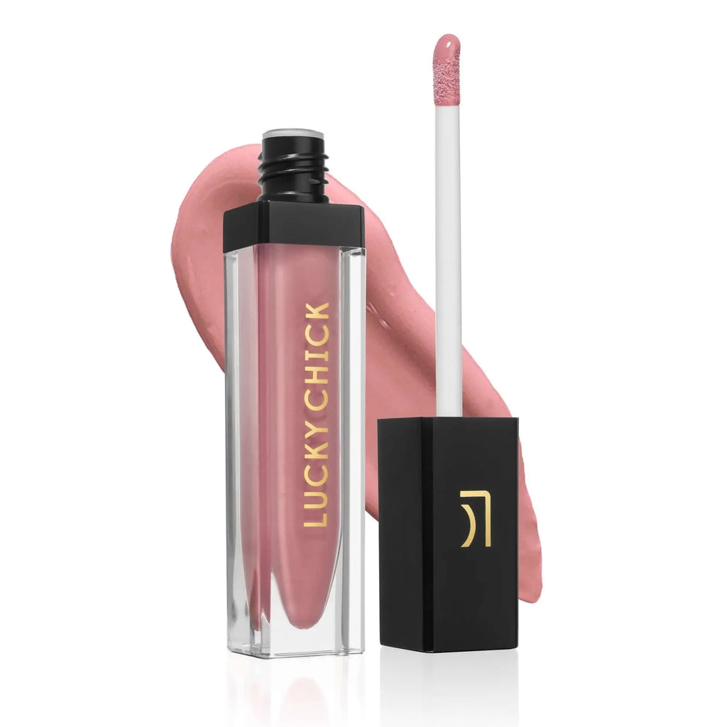 Lucky Chick Hydrating Lip Gloss in Sweet – clear tube with gold logo and black cap, dusty pink gloss finish