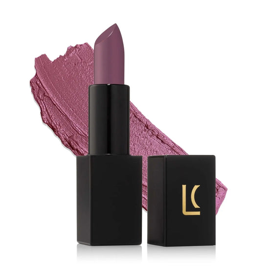 Lucky Chick Creamy Matte Lipstick in Splendid shade – hydrating long wear vegan lipstick. Lipstick swatch in the background